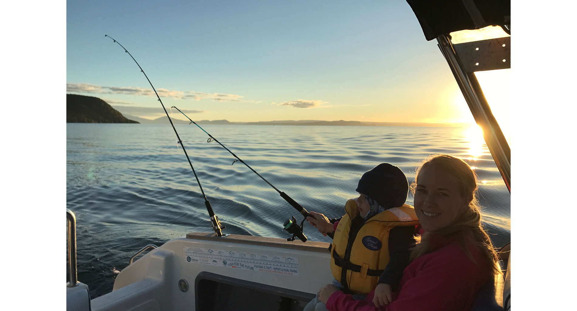 Family fishing in Lake Taupo - Vanya Insull
