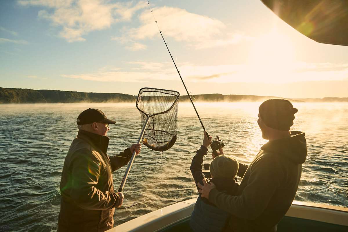 Catching Trout - Family Fishing In Western Bays At Sunrise, Lake Taupo - By Todd Eyre